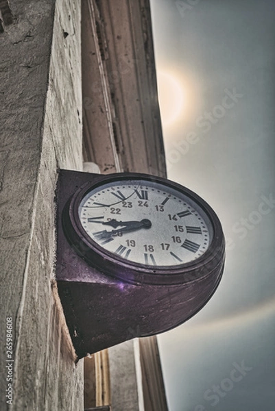 Obraz Old clock in sun and rainbow