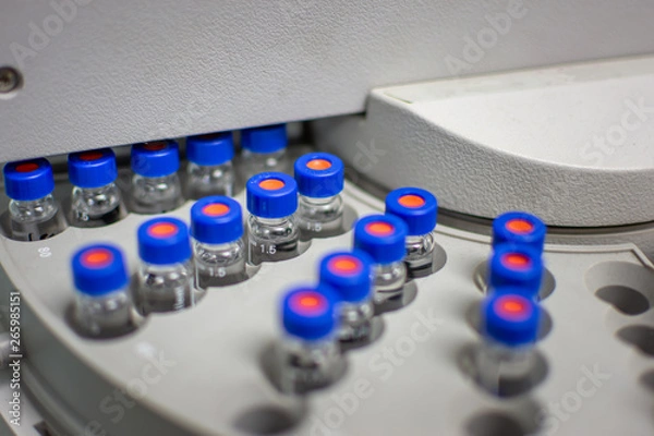 Fototapeta bottle group analysis for an experiment in a science research lab.