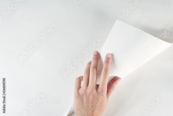 Fototapeta Hand turning page