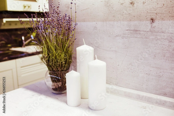 Obraz kitchen interior with white candle and lavender.