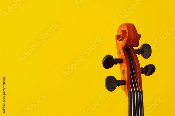 Fototapeta Classical music concert poster with orange color violin on yellow background with copy space for your text
