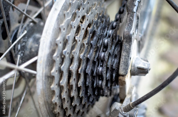 Fototapeta Dirty rear cassette with stars in oil and dust on a bicycle