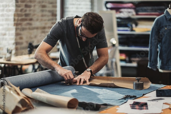 Obraz Fashion designer working in his studio