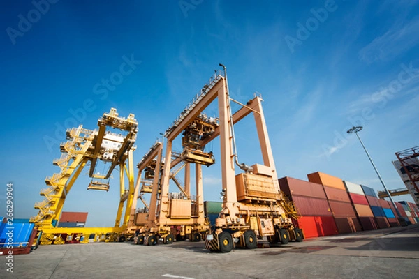 Fototapeta Transport logictic industry concept of cargo, truck, transportation, container box, vessel ship and working crane, import export business.