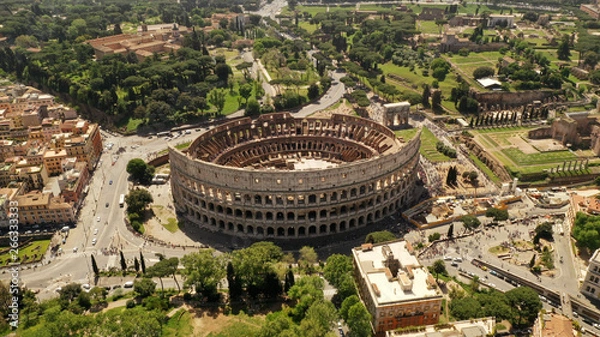 Fototapeta Aerial view on the Coliseum, Rome, Italy. Spring, summer. Ancient Rome architecture from drone.