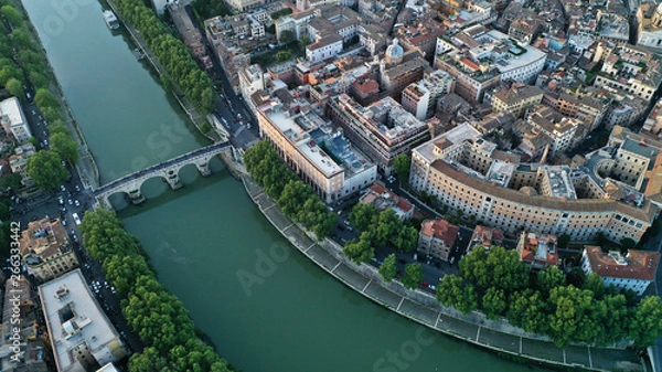 Fototapeta Aerial view of the Tiber River and center of Rome, Italy. Coliseum. Ancient capital. From drone.