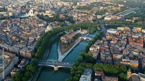 Fototapeta Aerial view of hospital on the Tiber Island, on the Tiber River, Rome, Italy. Coliseum.