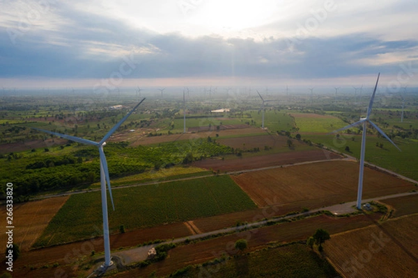 Fototapeta Aerial view of wind turbines on the field. Production of clean energy without pollution for the environment. Cleaner Power generation