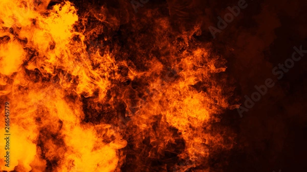 Fototapeta Fire flames texture on isolated black background. Perfect texture overlays for copy space.Design element