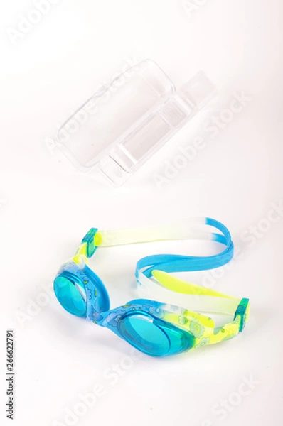 Fototapeta Swimming goggles isolated on the bright background