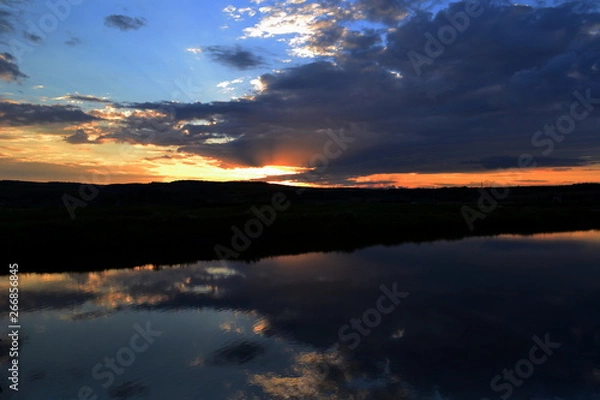 Obraz sunset with clouds on the lake