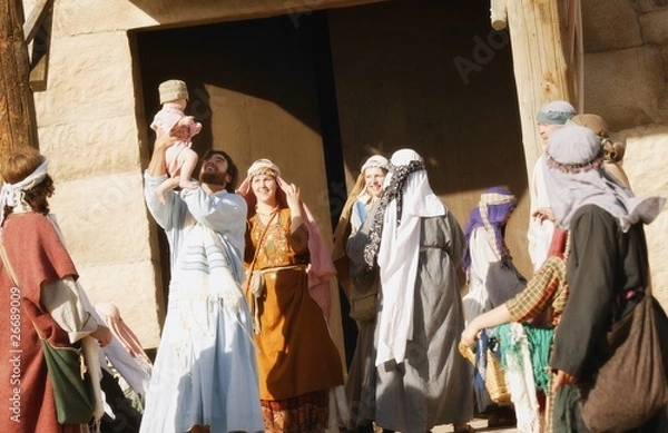 Fototapeta Group Celebrating Outside Synagogue