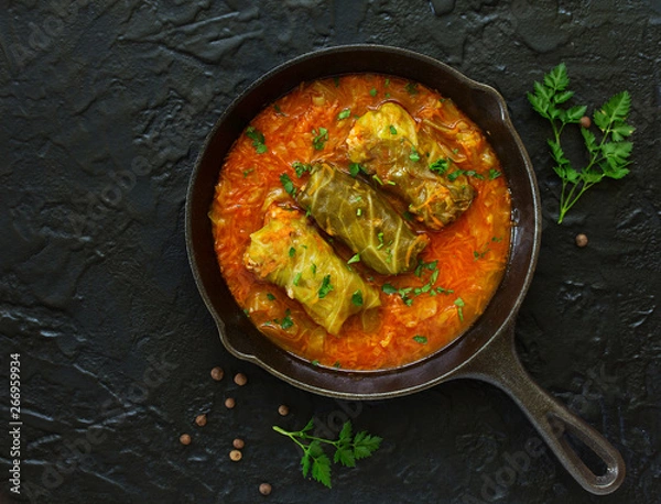 Fototapeta Ukrainian traditional dish with cabbage and stuffed cabbage. Selective focus.