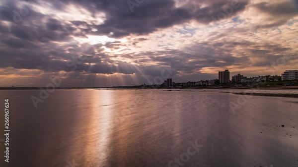 Obraz Rays on Estuary and Town