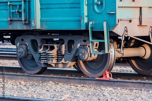 Fototapeta Railway carriage stands on the rails. Wagon wheels. Rails.