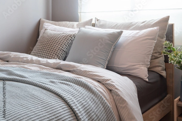 Fototapeta modern bedroom with set of pillows