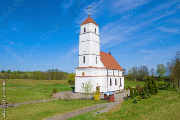Fototapeta The Transfiguration Cathedral on the territory of  ancient settlement on a sunny May day. Zaslavl, Belarus