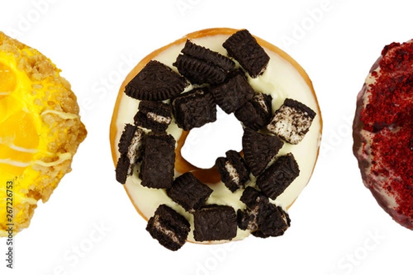 Obraz Colorful three doughnuts with sprinkles isolated on white background.