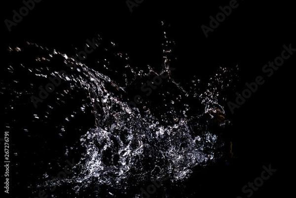Fototapeta Splash of water. Isolate on black background