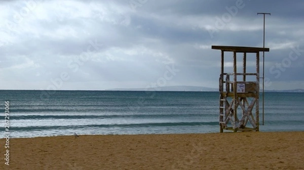 Obraz Watchtower on the sandy beach shore