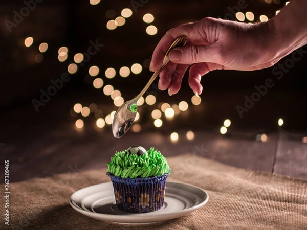 Obraz football cake with ball and grass on wooden background