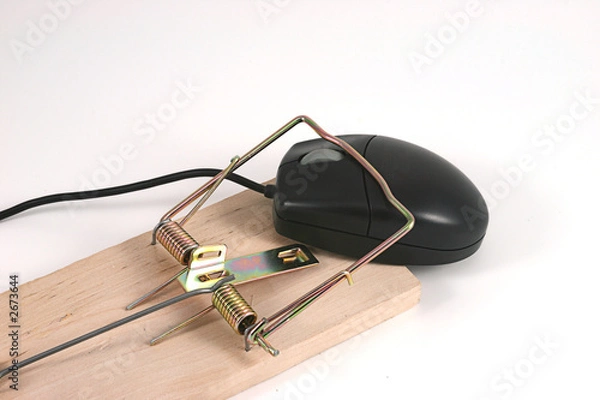 Obraz black computer mouse caught in a mouse trap