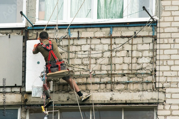 Obraz Thermal insulation of walls in the house foam in a high-rise building.