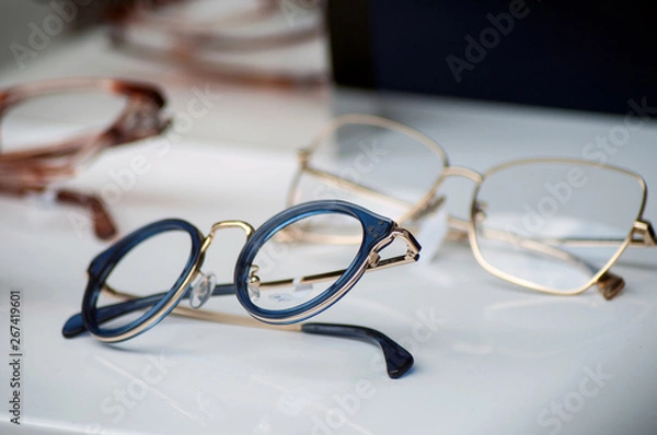 Obraz closeup of eyeglasses collection in store showroom
