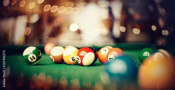 Obraz Colorful billiard balls on a billiard table.