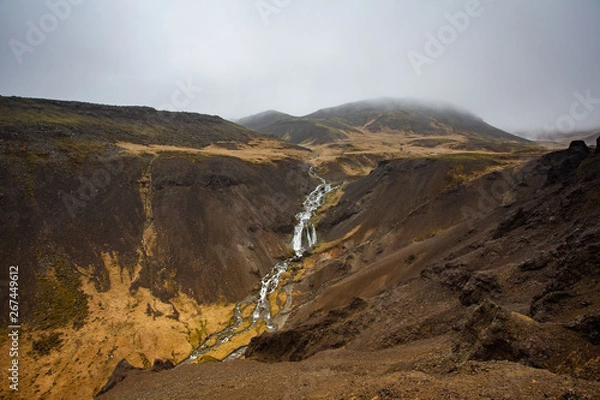 Obraz waterfall in mountains
