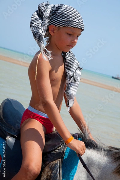 Obraz A boy on horseback