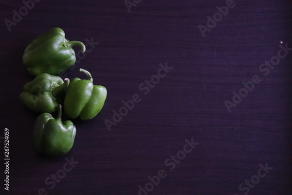 Obraz raw vegetables on a dark table