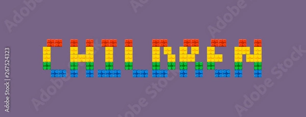 Fototapeta The word children written from fun colorful brick block constructor isolated on purple background. Mosaic lettering font for poster, banner
