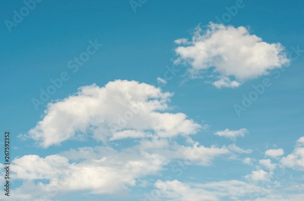 Obraz Blue sky and white clouds with blurred pattern background
