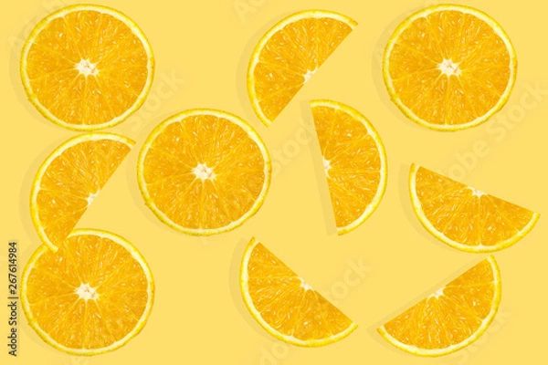 Fototapeta Creative summer pattern made of oranges  on pastel background. Fruit minimal concept. 