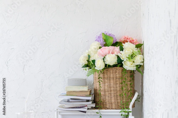 Fototapeta bouquet of flowers in a vase on wooden table