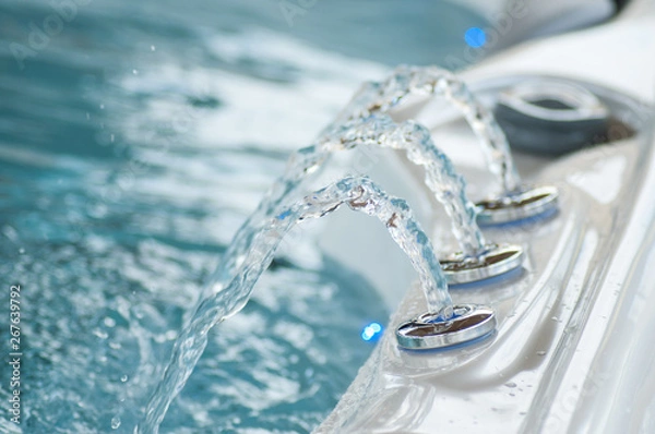 Obraz closeup of jet of water in swirl bath