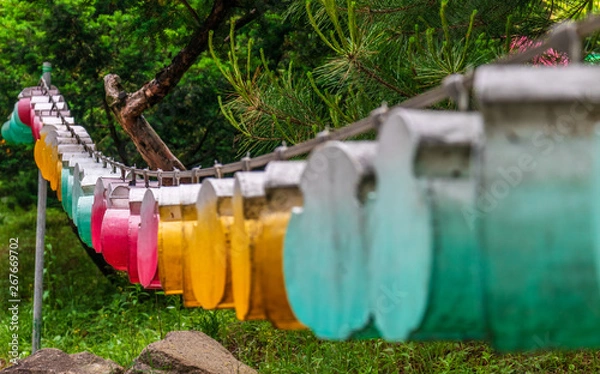 Fototapeta Different beautiful and colorful paper lanterns. The festival is a celebration the birth of Buddha in South Korea.