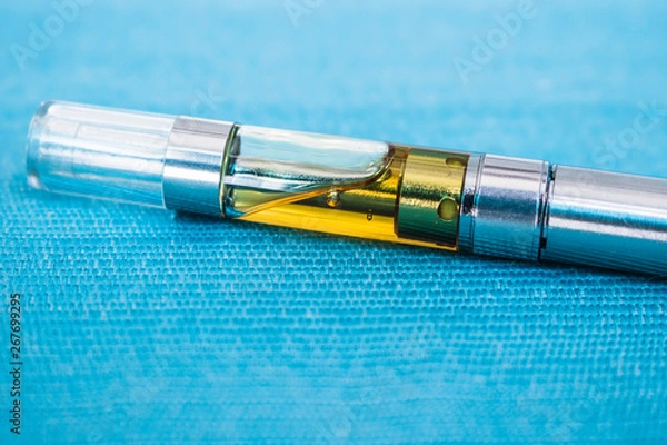 Obraz Oil Extract Vape Pen Up-close THC:CBD Concentrate With Terpenes Inside Cartridge For Consuming Marijuana Cannabinoids