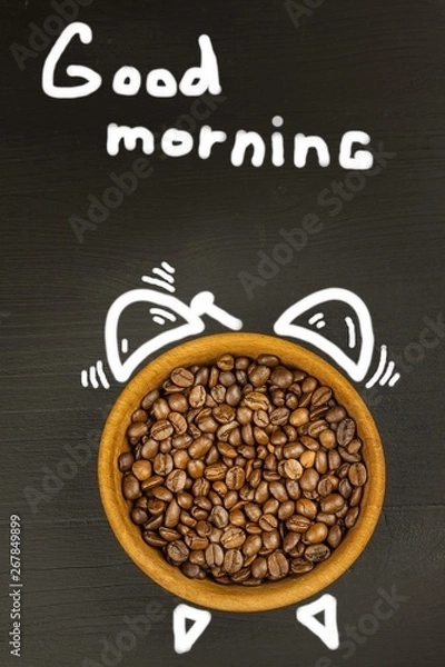 Fototapeta Fresh coffee and retro alarm clock. Concept of getting up to work. Morning awakening.