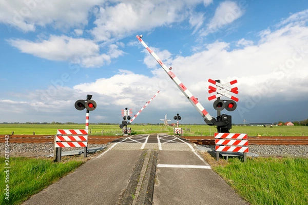 Obraz closing barriere at train rainway crossing