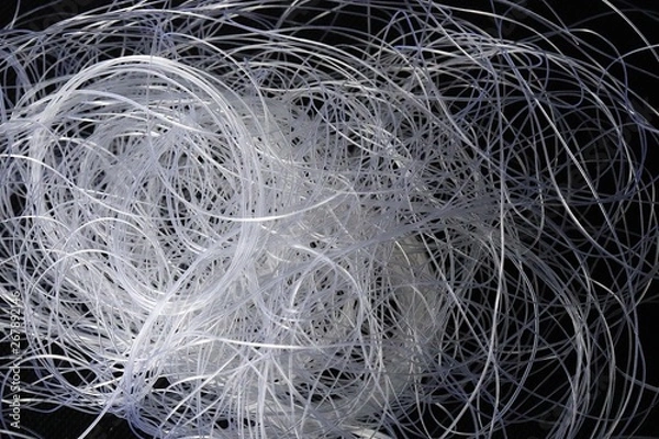 Obraz Close up of nylon thread on black background