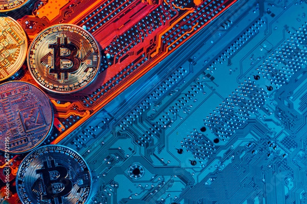 Obraz golden bitcoin and computer chip in background