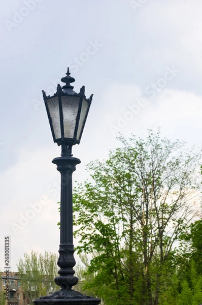 Obraz Classic style city lamppost at sunset, close up