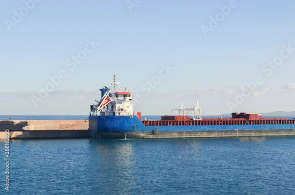 Obraz The barge standing in the sea dock in the early morning. Creete, Greece