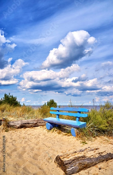 Fototapeta Blue bench on the cliff in Ückeritz on the beach. Baltic Sea in Mecklenburg-Vorpommern, Germany.