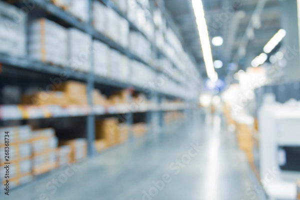 Obraz Blurred bix box store supercenter with customers shopping for home goods.