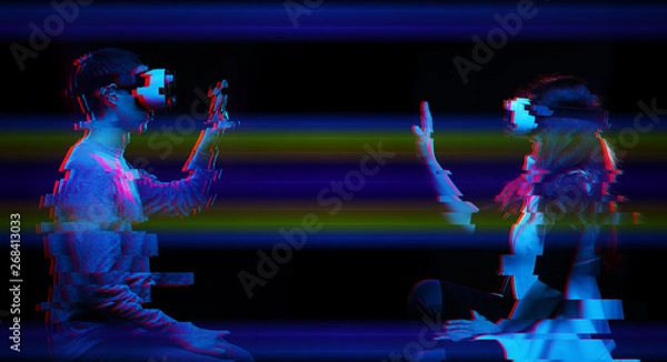 Fototapeta Couple of people communicate using a virtual reality headset. Image with glitch effect.