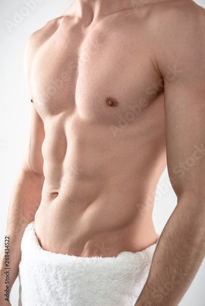 Obraz Young man demonstrating his perfect muscular body