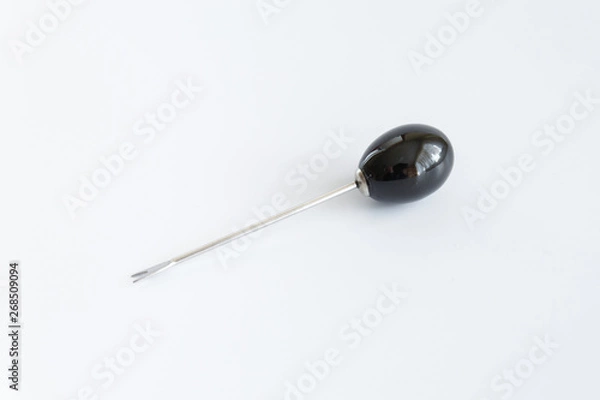 Fototapeta Olive forks. A device for impaling olives during the meal. Set of forks.